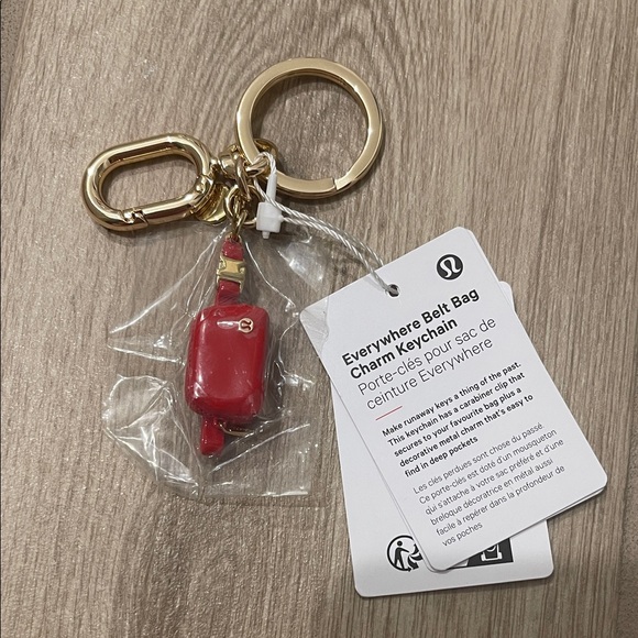 NWT Lululemon Everywhere Belt Bag Charm Keychain Lululemon Red/Gold O/S - Picture 1 of 6